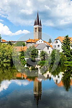 View of Telc across pond with reflections, Unesco world heritage site, South Moravia, Czech Republic