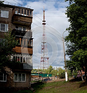 view of the television center with numerous  houses with trees on a warm summer day