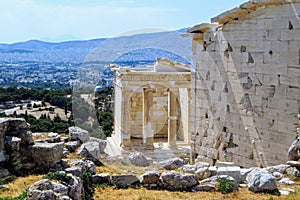 A view of the Temple of Athena Nike , which is a temple on the Acropolis of Athens, dedicated to the goddess Athena Nike.  The cit