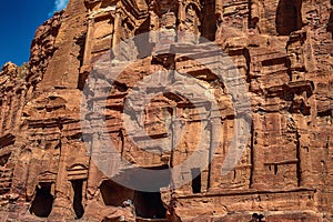 View of the temple and building carved into the sandstone rock. Petra, Jordan.