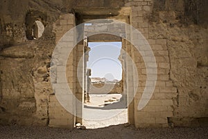 View through the Temple of the Oracle of Amun to Gebel el-Dakrour in Siwa Oasis