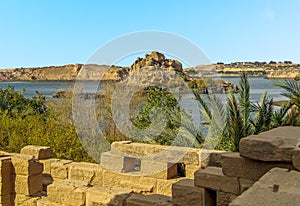 A view from the temple on Philae Island towards Bigeh island in the Nile near Aswan, Egypt