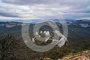 View of Temple of the Sun, Tyshlar rocks from top of Ilyas-Kaya mountain. Crimea photo
