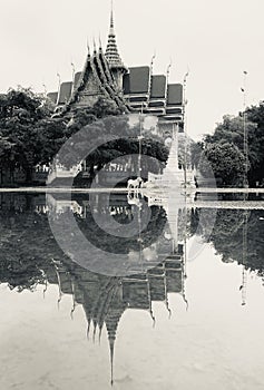 View of temple in Thailand with water reflection