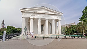 View of the temple Theseus timelapse hyperlapse and historic park Volksgarten with its old rosarium in Vienna in Austria