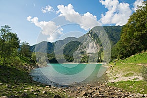 View of Tenno lake. Small and beautiful lake in Italian alps (Monte Misone), Trento province