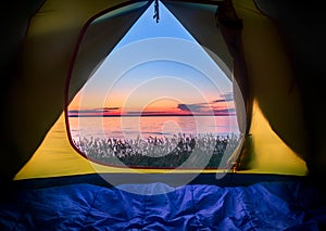 View From the Tent. Hiking, Beautiful Sunset from Entrance of Tent. Traveling by Savage