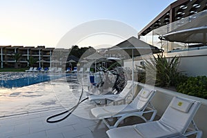 View from terrace of restaurant on the swimming pool and aqua bikes in Holiday resort TUI Magic Life Candia Maris.