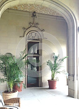 View of the terrace of a stone mansion