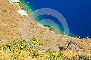 View of Thirasia island coast Aegean Sea Cyclades Greece photo
