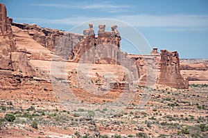 View of Three Gossips along North Park Avenue in Arches National Park Utah USA