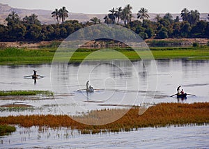 View of three small fishing boats on the river Nile, Egypt