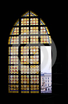 View threw a Stained Glass Window to an Old City in Krakow, Poland