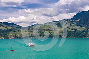 View of Thun lake with cruise ship from Spiez village, Switzerl