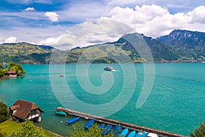 View of Thun lake with cruise ship from Spiez village, Switzerl