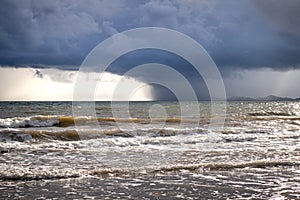 View of thunderstorm clouds above the sea