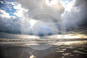 View of thunderstorm clouds above the sea