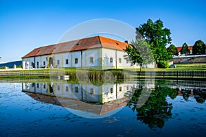 View of a Tierpark Schloss Hof and a reflection in the lake in Austria