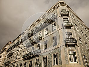 A view of a tiled building against a cloudy sky, Lisbon, Portugal.