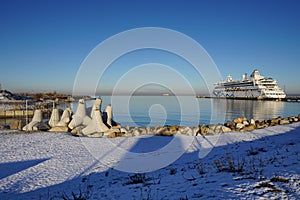 View to Aida Vita cruise ship moored at the dock at cruise port with the sunny winter weather.