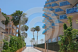 View to Albir seaside beach and Mediterranean Sea from Albir street. Albir is stylish modern seaside resort of L photo