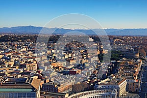 View to amazing cityscape of Rome from the top of dome Saint Peter`s Basilica. Winter morning. Rome. Italy