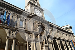 Ancient street clock on the  Giureconsulti Palace building roof at the Mercanti square of Milan. photo