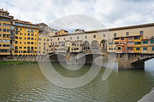 View to the Arno river and old bridge Ponte Vecchio in Florence, Italy