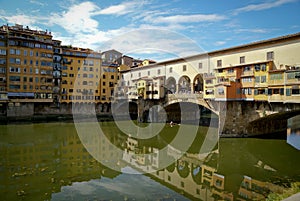 View to the Arno river and old bridge Ponte Vecchio in Florence, Italy