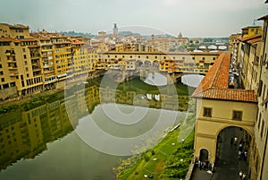 View to the Arno river and old bridge Ponte Vecchio in Florence, Italy