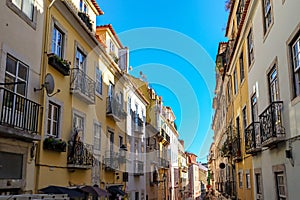 View to the Bairro Alto district in the historic center of Lisbon, traditional facades in the streets of the old town, Portugal photo