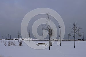 View to Baltic sea and grey sky. Fresh white snow during winter time. Reidi tee, Tallinn, Estonia, Europe. January 2024