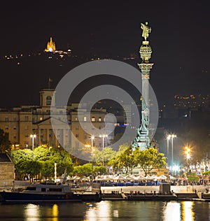 view to Barcelona Port with statue of Columbus in night