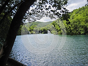 view to the bay with a waterfall photo