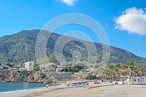 View to beautiful Albir town with main boulevard promenade, seaside beach and Mediterranean sea. Albir is small