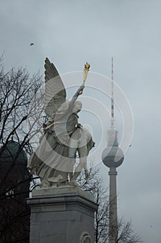 View to Berlin television tower from Palace bridge with angel st