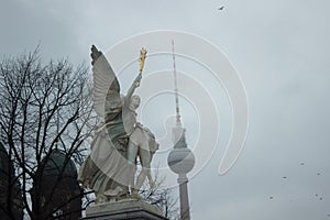 View to Berlin television tower from Palace bridge with angel st