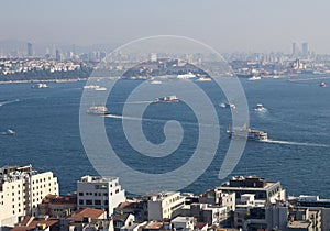 View to Bosphorus, ships, boats, ferry, skyline of buildings Istanbul Turkey