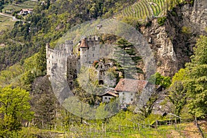 View to Brunnenburg castle near Dorf Tirol South tyrol, Italy seen from hiking trail to Castle Tyrol