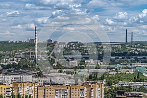 View to the buildings, tailpipes and greenery of Chisinau