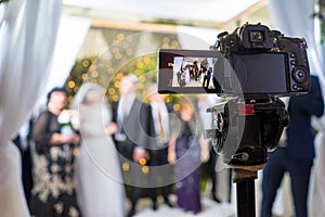 View to the camera display recording Jewish chasid wedding