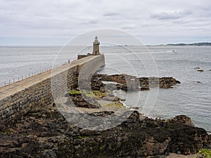 View to Castle Breakwater Lighthouse, St Peter Port, Guernsey, Channel Islands photo
