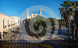 View to the cathedral of Merida over the main square park `Plaza Grande` in Merida, Yucatan, Mexico