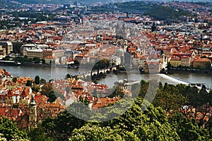 View to Charles bridge from Petrinska rozhledna tower in sping Prague in Czech republic photo