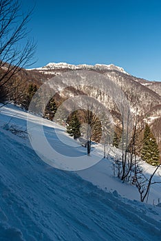 View to Cierny kamen hill in winter Velka Fatra mountains in Slovakia