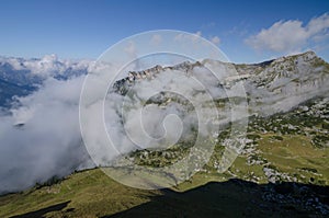 View to cloudy Rofan Alps, The Brandenberg Alps, Austria, Europe photo