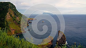 View to coastline of Flores island and Corvo island from Miradouro dos Caimbros, Azores, Portugal