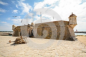 View to entrance gate of fortress Forte da Ponta da Bandeira in Lagos, Algarve Portugal Europe