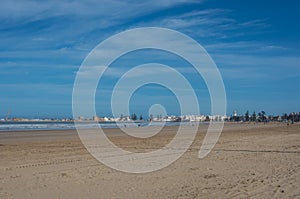 View to Essaouira medina rampant and ocean from sand city beach, Morocco