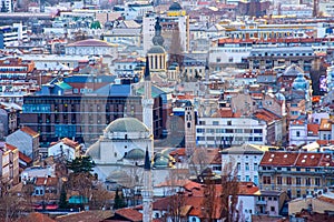 View to the Gazi Husrev Bey mosque and clock tower in Sarajevo